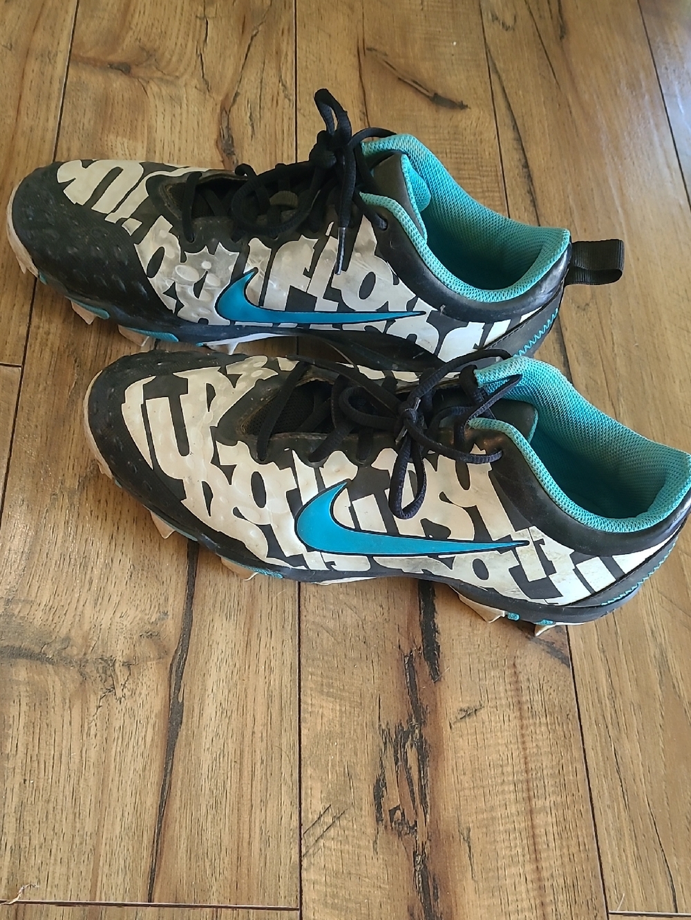 Nike Baseball Cleats in Black and Teal Graphic Print